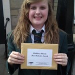 Hannah gives a cheesy grin!