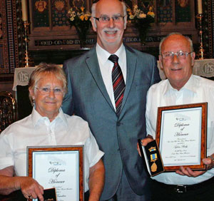Sylvia Risby and Bob Tresedern receive their 60 Years Service Awards