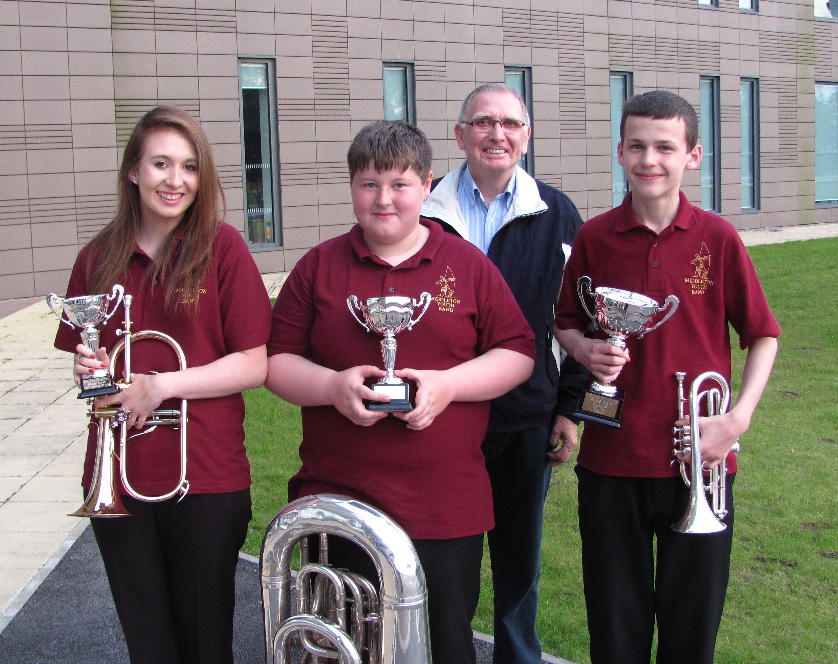 Jenny, Steven and Callum with their awards, presented to them by the band President