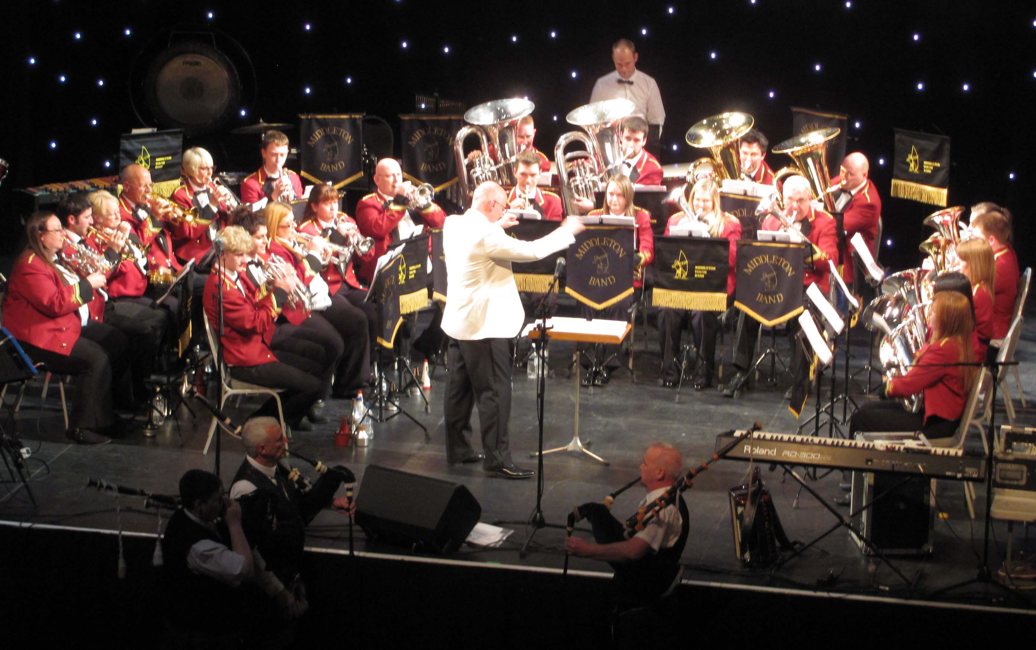 Middleton band play Highland Cathedral with special guests Manchester Community Pipe band.