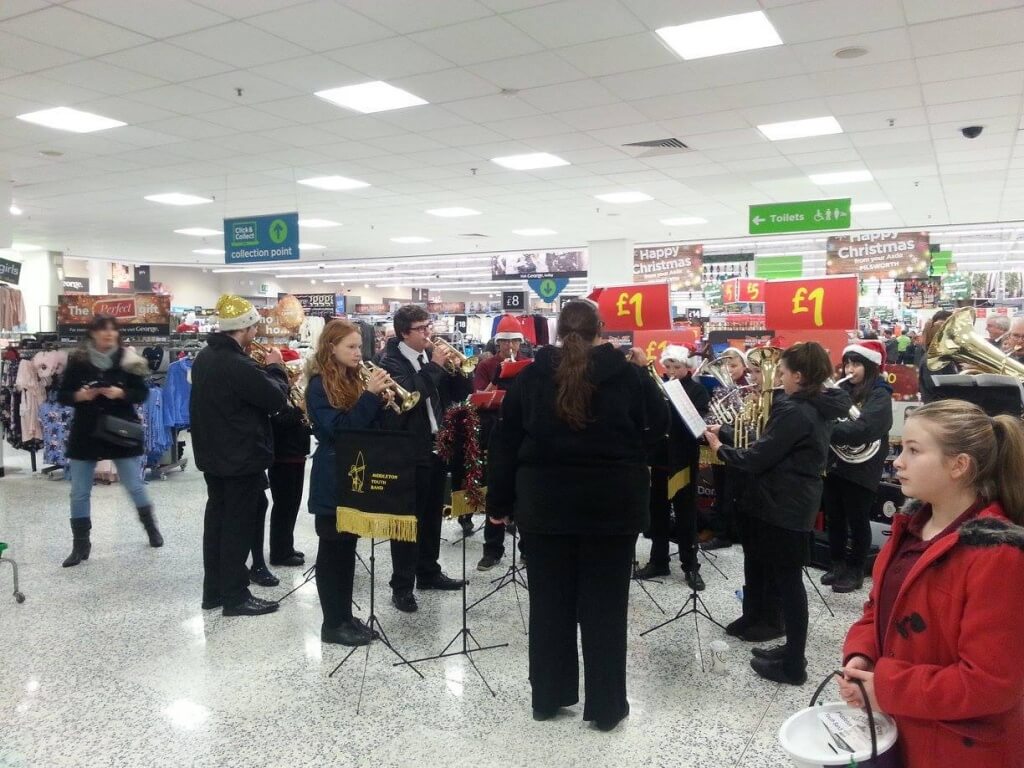 Youth Band playing carols at ASDA Pilsworth 2015